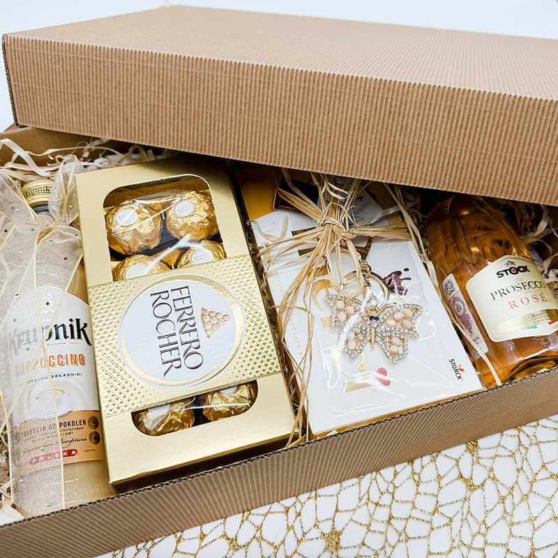 Zestaw prezentowy z Prosecco i słodyczami w złotej aranżacji